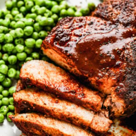 An air fryer pork chop cut into slices